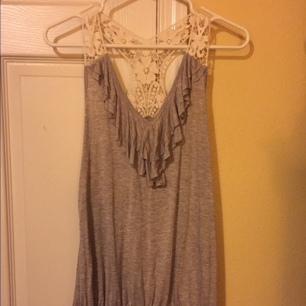 Cute tang top with ruffles and doily accent straps